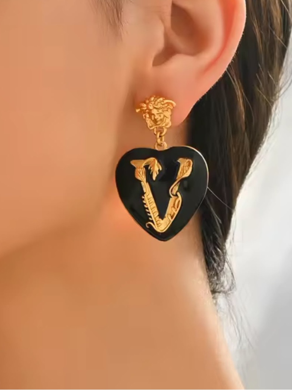 Anthropologie Black and Gold Tone Heart Drop Earrings
